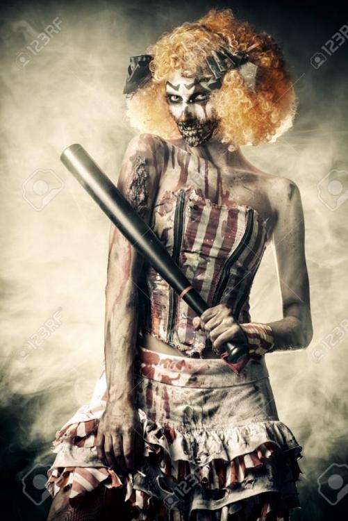 64470062-evil-clown-murderer-stained-in-blood-female-zombie-clown-halloween-horror-.jpg