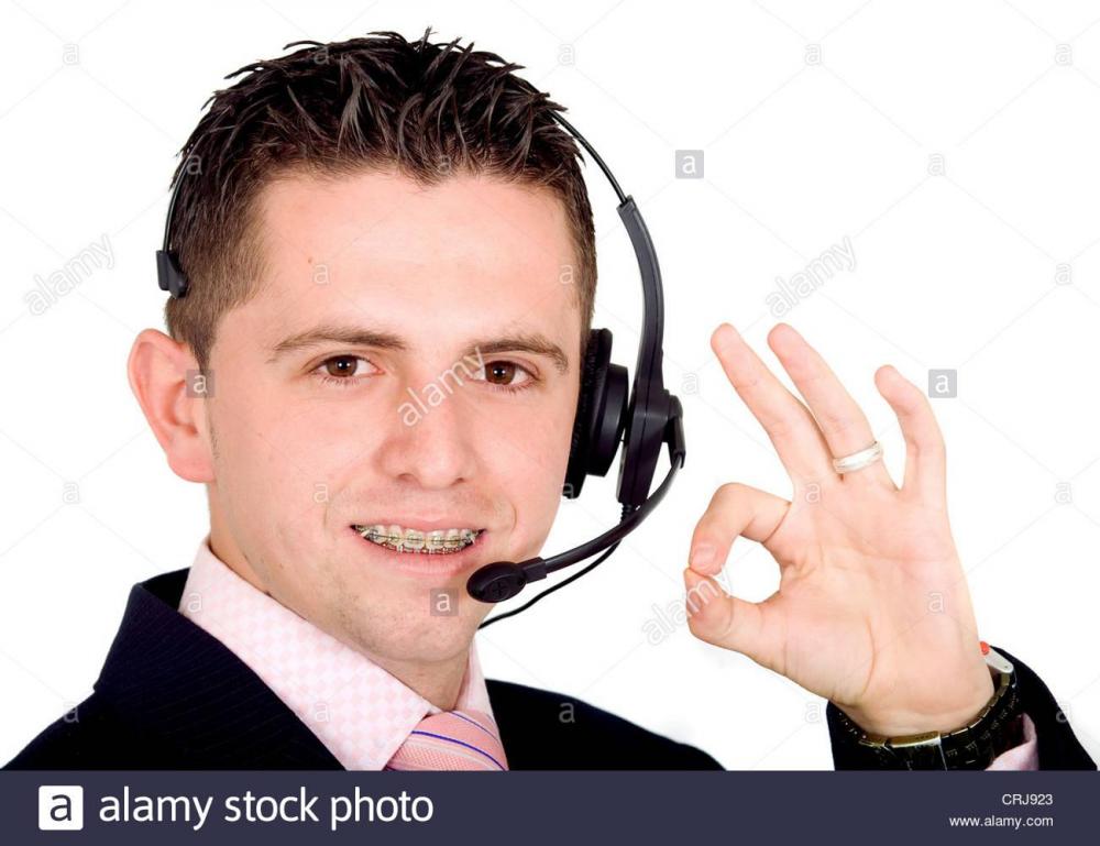 young-customer-service-man-with-brace-doing-the-ok-sign-CRJ923.jpg