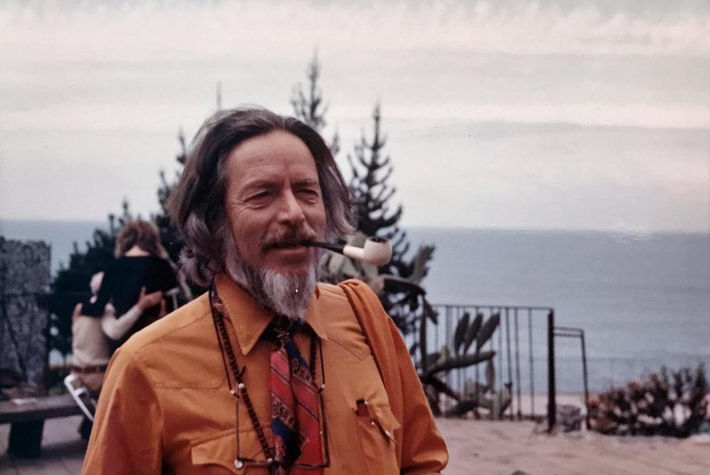 alan-watts-orange-shirt-pipe.jpg